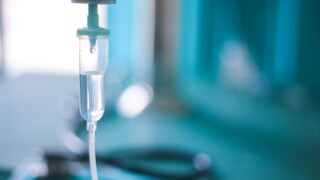 IV fluid drip in a hospital room